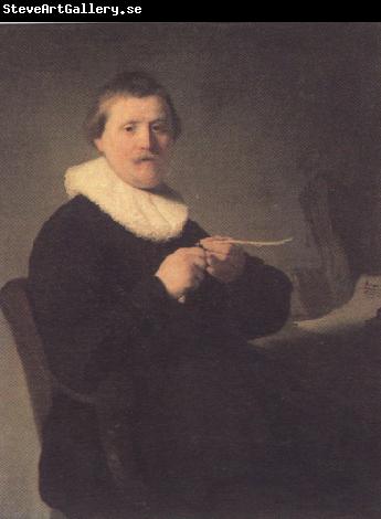 REMBRANDT Harmenszoon van Rijn Portrait of a man trimming his quill (mk33)